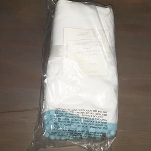 Pottery Barn Baby Organic Pom Pom Crib Skirt